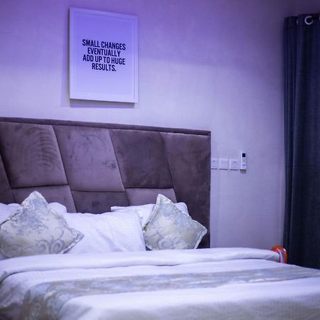 Vibes Suites Kaba Bagian luar foto